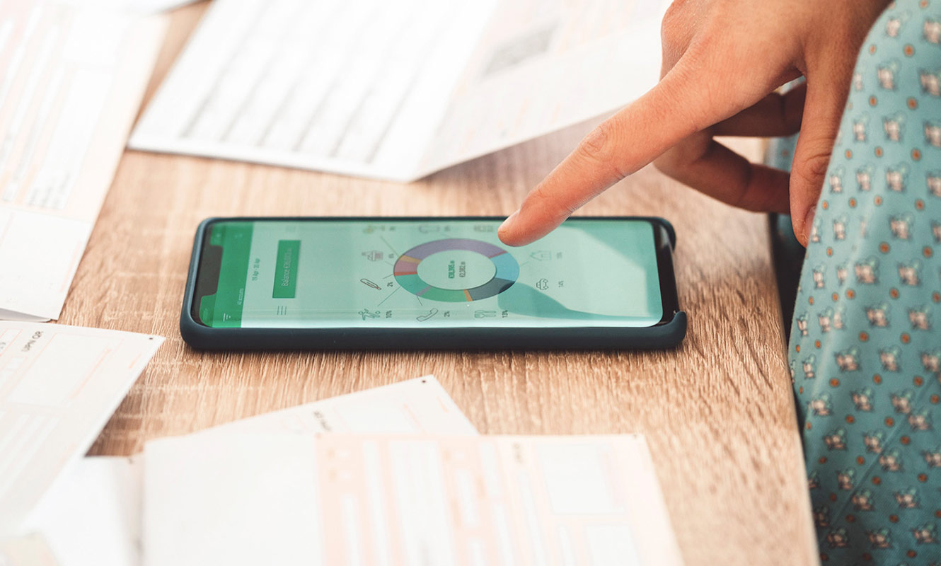 Person using mobile app to check their bank balance.