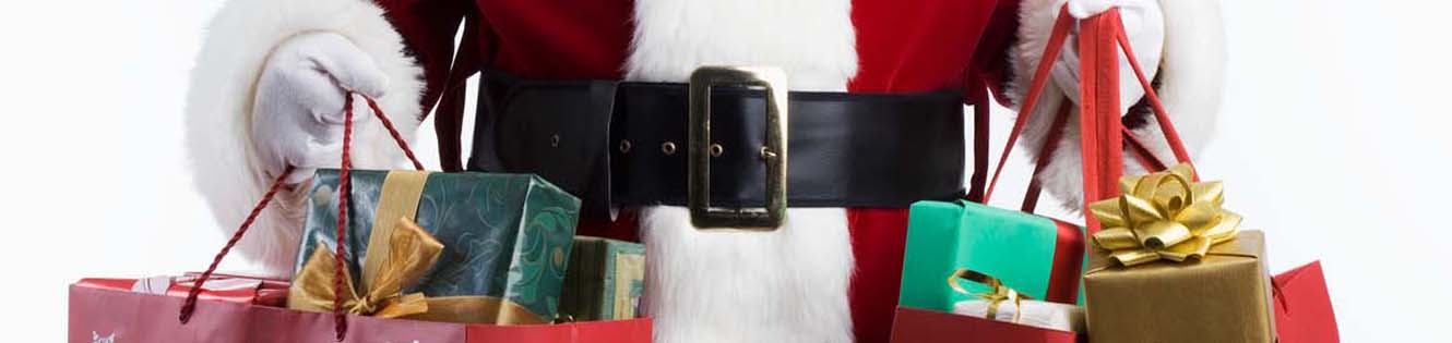 Santa holding gift bags